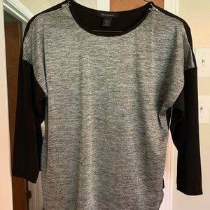 Cute top with zippers on shoulders!